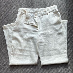Cream H&M flat front, straight leg trousers.